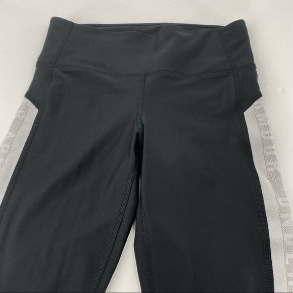 Women’s Under Armour black leggings with white stripe compression/heatgear - Picture 2 of 6